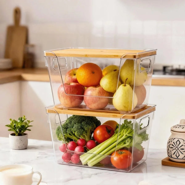 Stackable pantry organizer with a bamboo lid holding fresh produce like apples, oranges, and tomatoes.