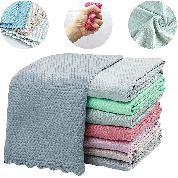 A set of reusable microfiber cleaning cloths in various shades of blue, green, and pink stacked and displayed.