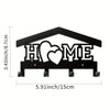 Black rustic metal wall hook key holder shaped like a house with a heart and the word HOME