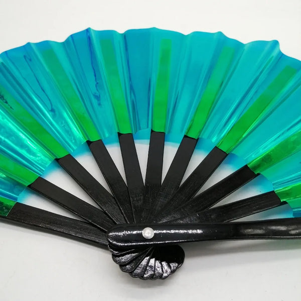 Hand fan with laser-cut blades featuring a gradient of blue and green colors.