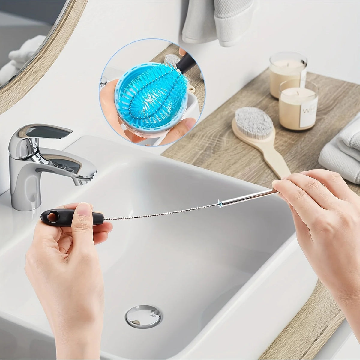 A hand is using a stainless steel bottle brush set with long handles to clean a sink, with an inset showing the blue brush he
