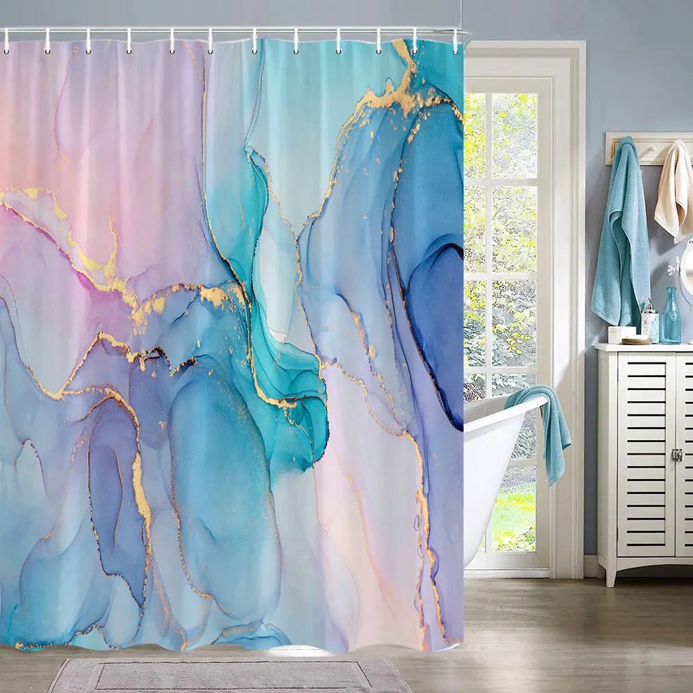 A sheer shower curtain featuring abstract fluid textures in shades of blue, purple, and pink with gold accents.