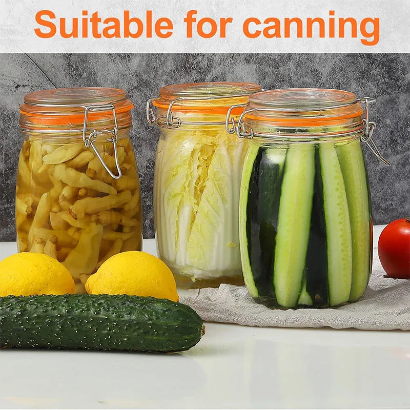 Glass mason jars filled with pickled cucumbers and lemons, suitable for canning.
