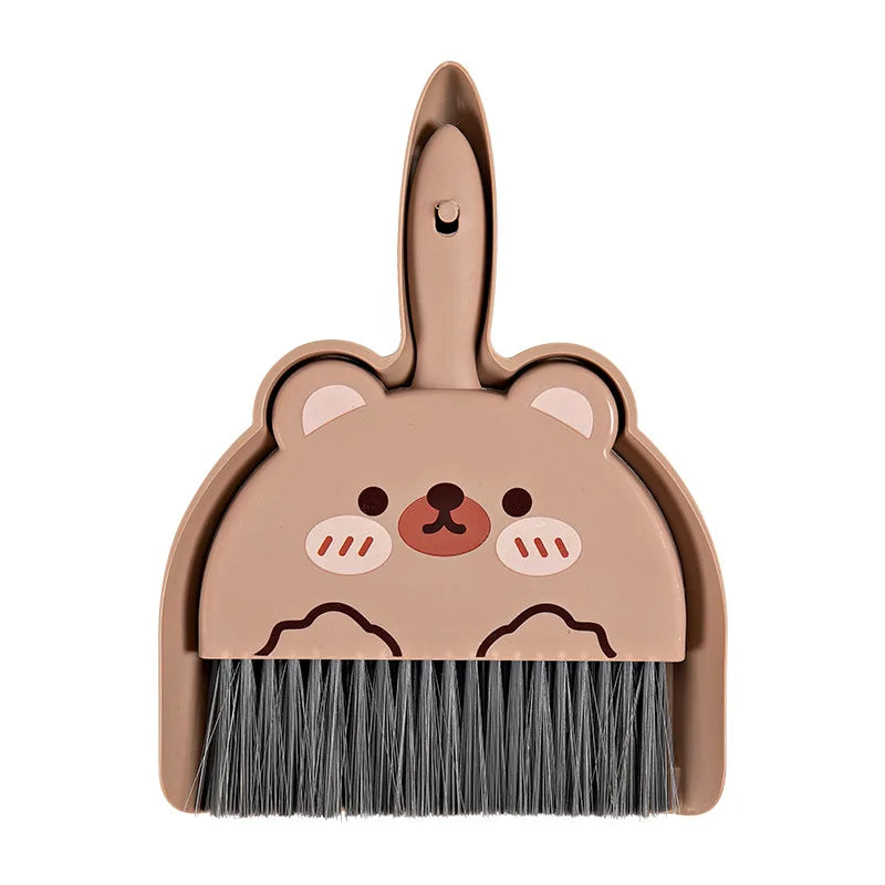 A light brown cartoon bear-shaped broom and dustpan set.