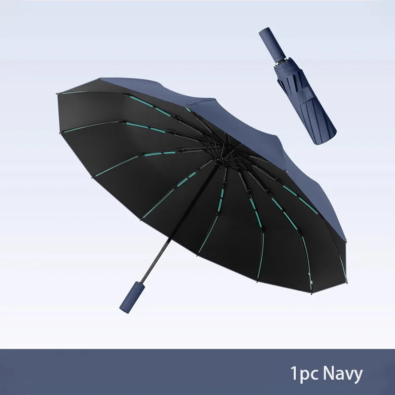A black umbrella with navy accents is shown open against a light gray background.