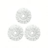 Four white microfiber spin mop heads arranged in a row.