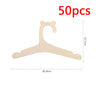 A light wooden clothing hanger shaped like a stylized animal for kids and apparel.