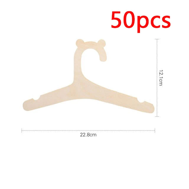 A light wooden clothing hanger shaped like a stylized animal for kids and apparel.