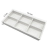 White dental autoclavable cabinet tray organizer with a rectangular shape and divided compartments.