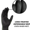 Close-up view of a black disposable nitrile cleaning glove showing the texture and grip.