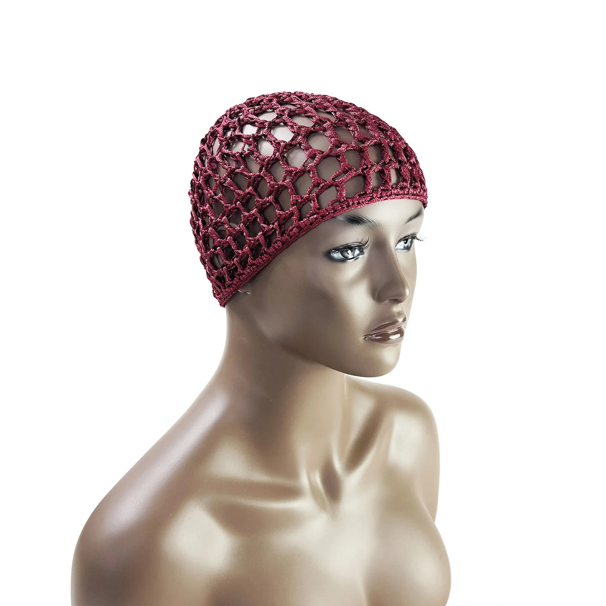 A model wears a deep red hand-crocheted mesh hair net cap on her head.