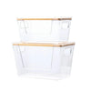 Stackable pantry organizer with a clear plastic body and a bamboo lid.