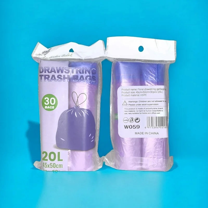 A pair of purple drawstring trash bags are displayed in clear plastic packaging against a blue background.