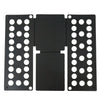 Black plastic clothes folding board with multiple circular holes for laundry organization
