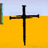 A black metal cross silhouette is painted on a bright yellow wall against a light purple background.
