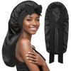 A woman models a black satin sleeping bonnet with a bow, shown alongside the unfastened product.