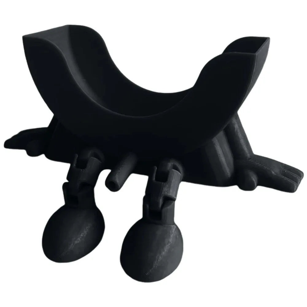 Black multi-use sponge holder designed for kitchen drainage.