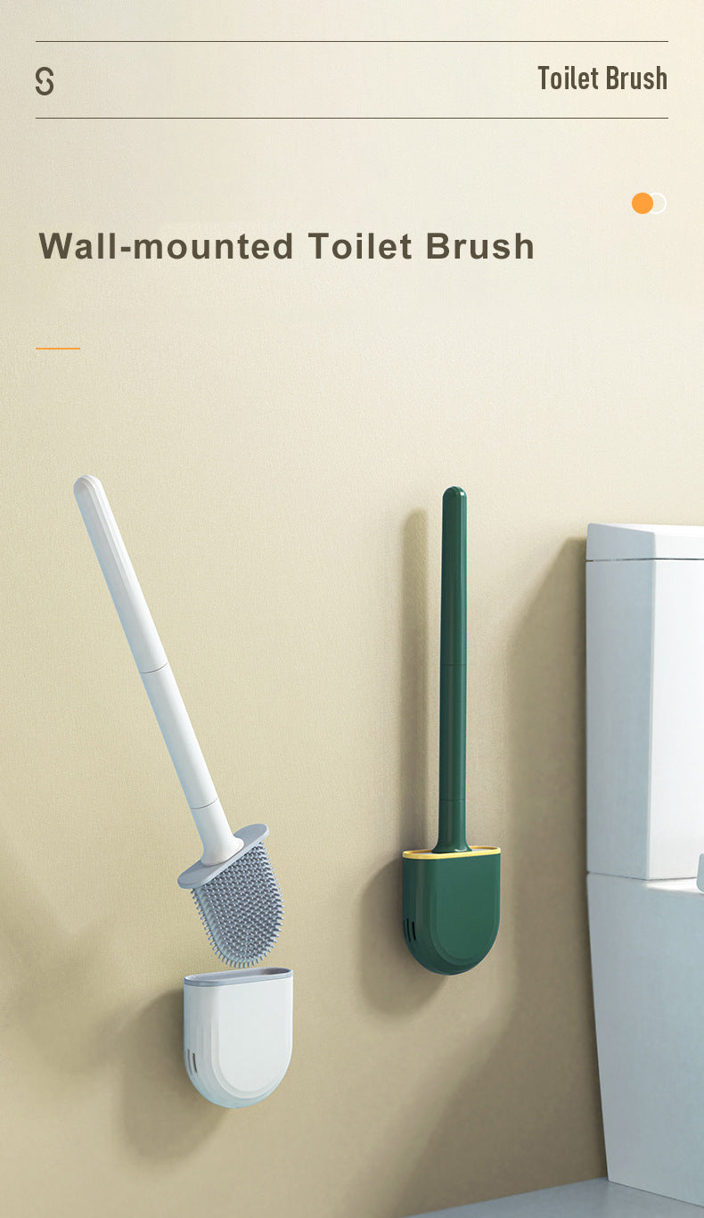 Un ensemble de brosses de toilette en silicone blanc et vert, fixé au mur, présenté contre un mur beige.