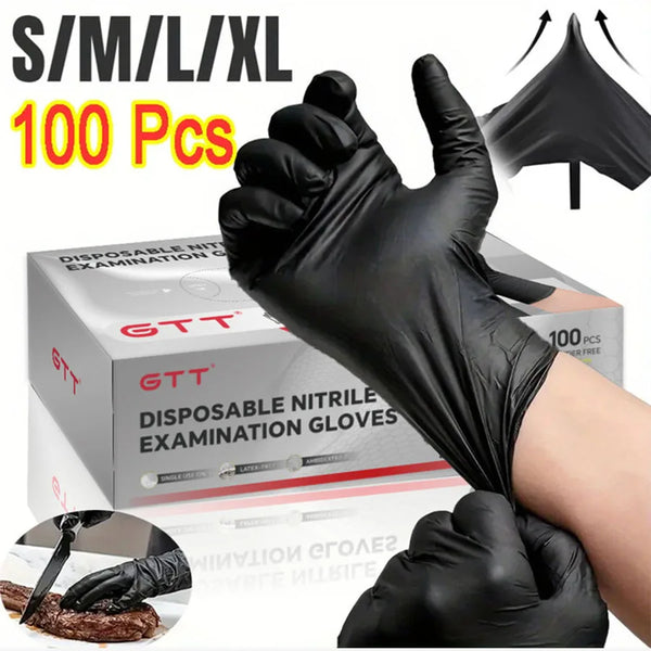 A hand wearing a black disposable nitrile examination glove is shown holding a package of 100 gloves.