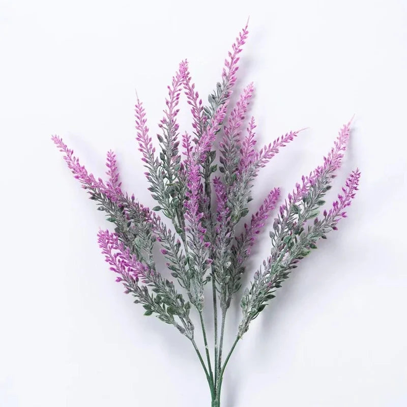 A sprig of artificial lavender flowers with purple spikes and silvery-green foliage.