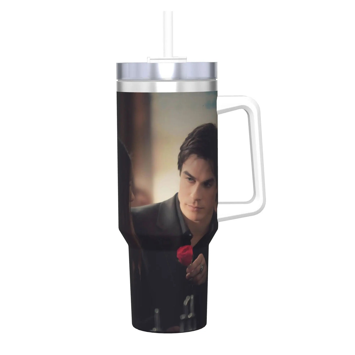 A stainless steel thermal tumbler with a silver straw featuring a close-up portrait of a man.