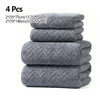 A stack of four gray microfiber absorbent towels, including two small and two large sizes.