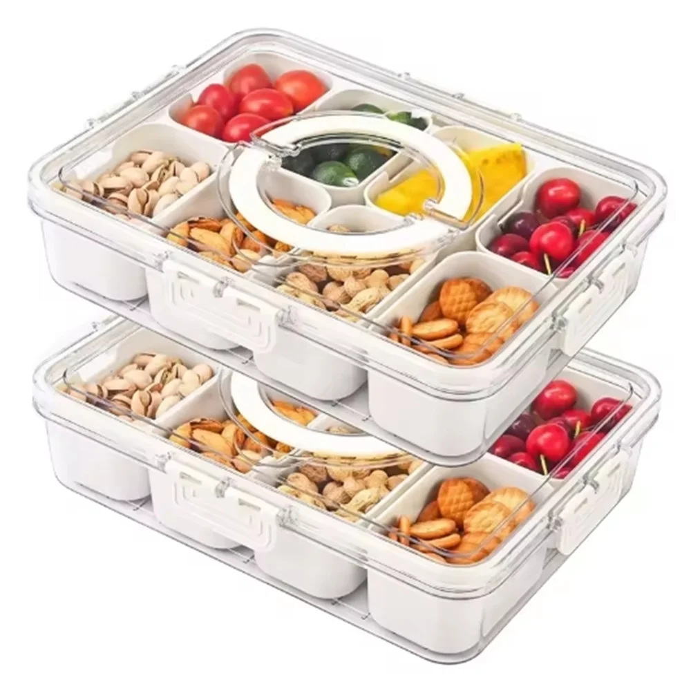 A clear plastic snack organizer tray with eight compartments filled with various nuts, dried fruits, and colorful candies.