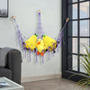 Yellow plush animal hammock storage net hanging on a wall