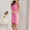 A woman wearing a pink ultra-absorbent quick-drying bath wrap towel dress.