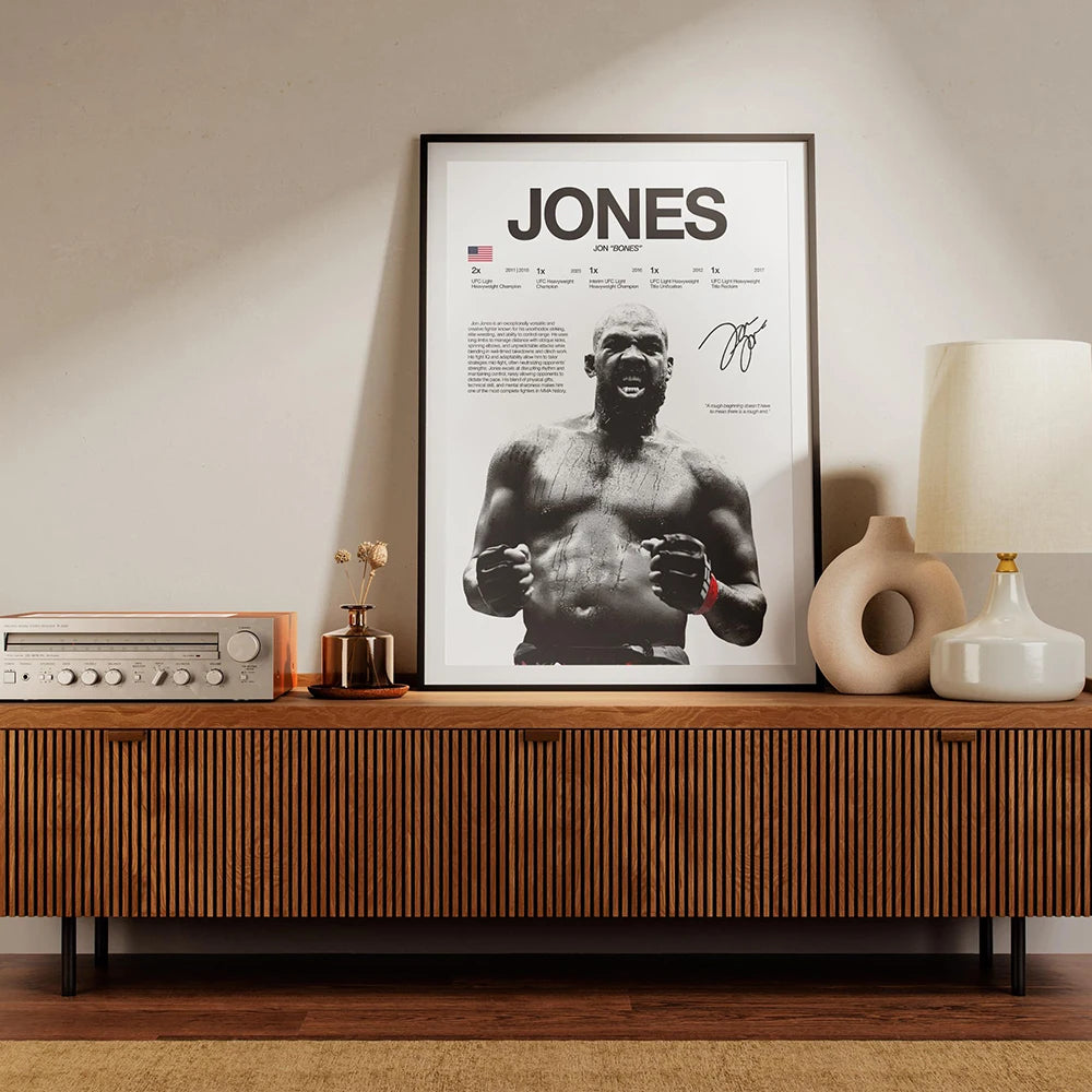 A framed black and white canvas art print featuring a muscular man with a beard and intense expression.