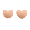A pair of light peach silicone heart-shaped charm beads for DIY jewelry.