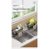 A stainless steel sink drain rack and sponge holder with a hanging hook placed on a kitchen sink.