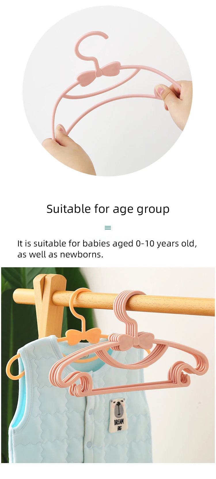 Pink plastic clothes hangers suitable for babies and toddlers shown hanging on a wooden rod.