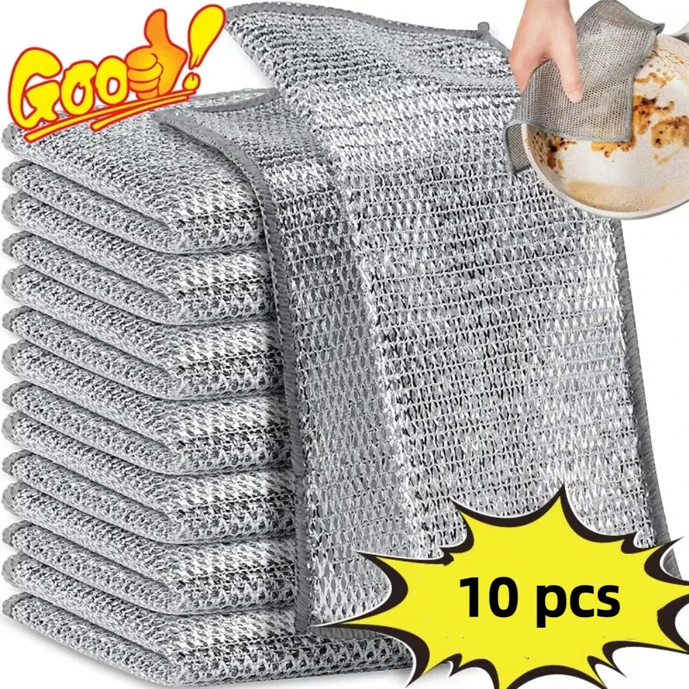 A stack of ten gray non-stick wire cleaning dish rags is shown next to a hand holding a dish.