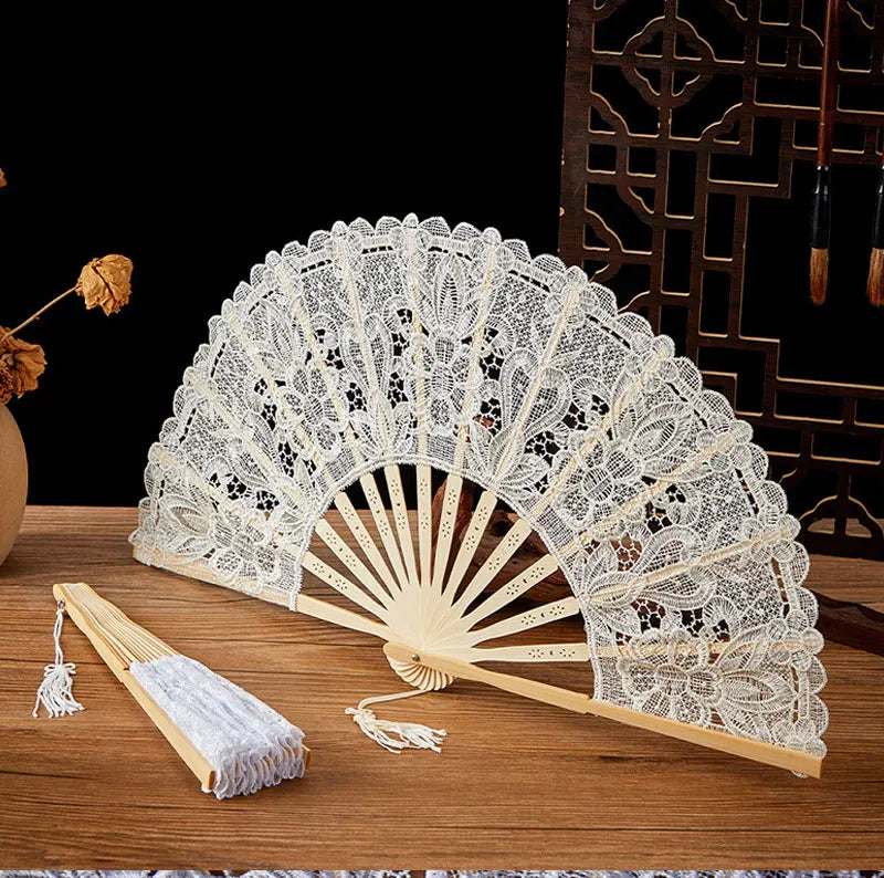 Elegant lace folding handheld fan with wooden ribs and decorative patterns