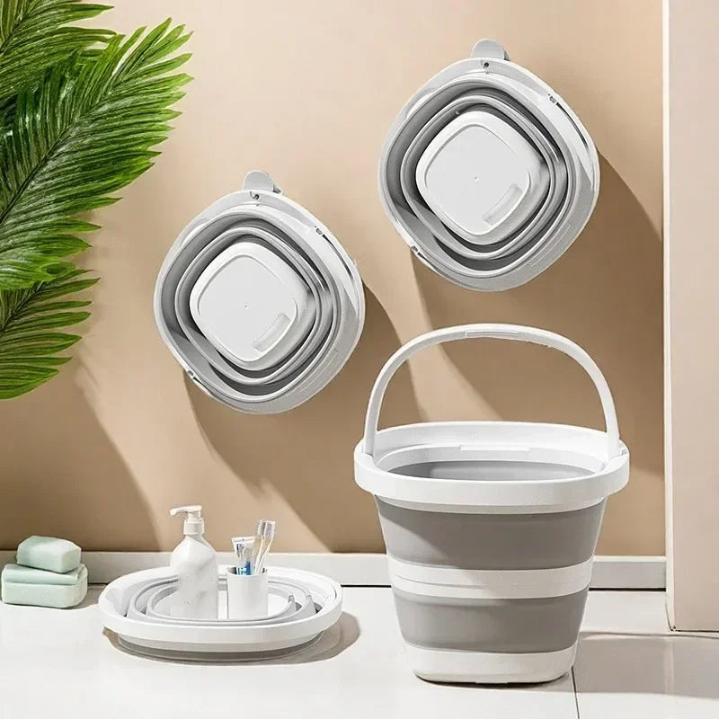 A white collapsible water bucket with a handle is shown alongside its various storage and stacking components.