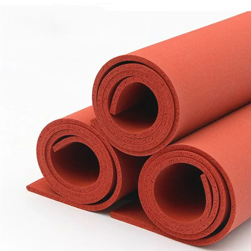 Rollen von orangefarbenem, hitzebeständigem Silikon-Schaummatmaterial