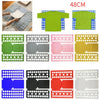 A set of plastic clothes folding boards in various colors and sizes for laundry organization.
