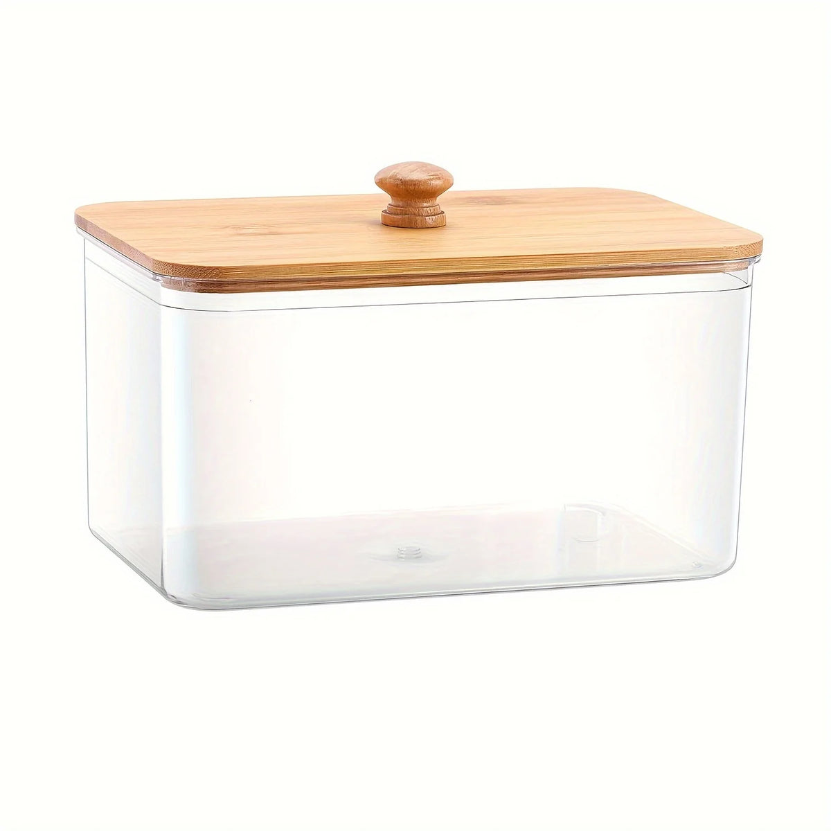 A clear glass container with a wooden lid used for storing dryer sheets.