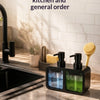 A black dispenser set for kitchen and general order soap, featuring glass bottles and a yellow sponge.