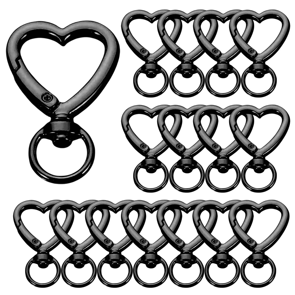 A set of black heart-shaped spring hook keychains.