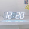 Weißer 3D-LED-Digitaluhr mit der Anzeige 12:20, auf einer weißen Oberfläche.