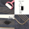 A hand towel product featuring a rolled white towel and a black book illustration on a dark gray fabric with gold stripes.