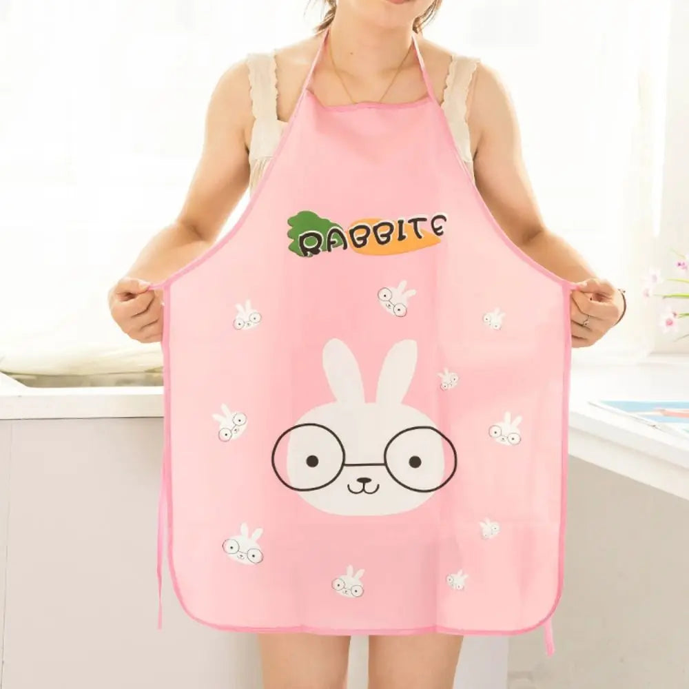 Pink oil-proof cooking apron featuring a white rabbit design with glasses and small bunny motifs