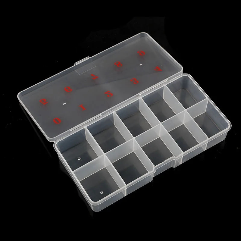 A clear plastic organizer box with multiple compartments for storing nail art supplies and tools.