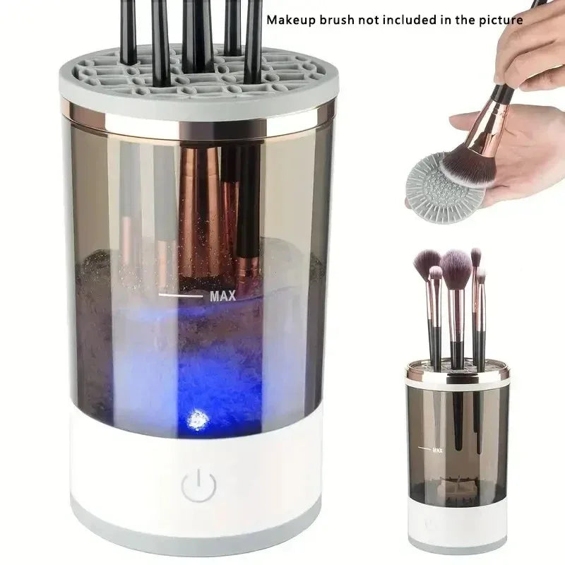 A white automatic electric makeup brush cleaner device with multiple brush holders and a charging base.