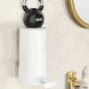 A white portable soap bar grinder with a black top and silver handle is mounted on a wall.