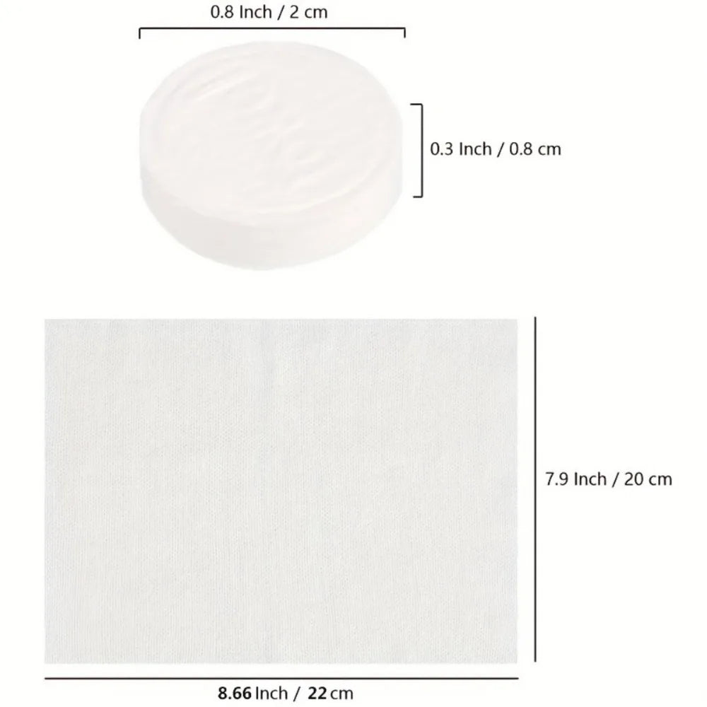 A white disposable compressed travel towel with dimensions of 0.8 inch by 2 cm and a size of 7.9 inch by 20 cm.