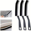 Three black crevice cleaning brushes with silver tips shown next to various surfaces.