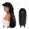 A woman models a black satin sleeping bonnet for curly hair, shown on her head and as a separate item.